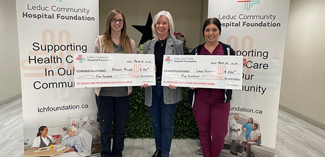 Vice Chair of the Foundation Board, Camille Bailer (centre), presents cheques to award recipients Brooke Miller (L) and Lacey Nikipelo (R).